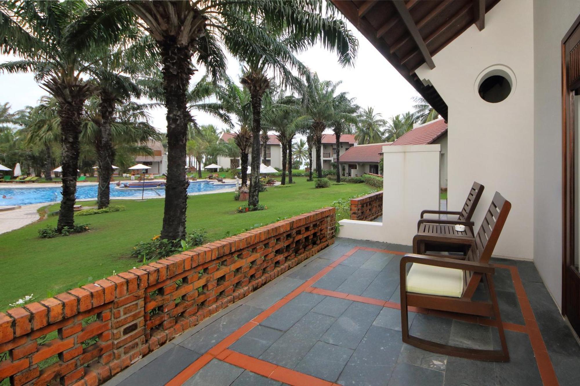 Palm Garden Beach Resort & Spa Hội An Kültér fotó A view of the pool from a room at the resort